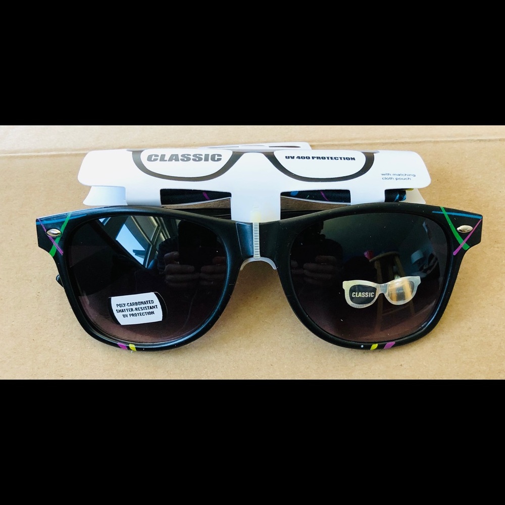 Sunglasses with matching pouch. Brand new
